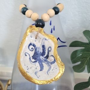 Oyster shell bottle charm in blue and white